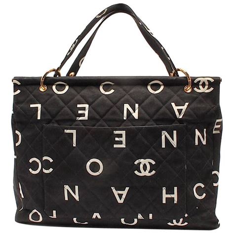 chanel black tote with white cc|Chanel black canvas tote.